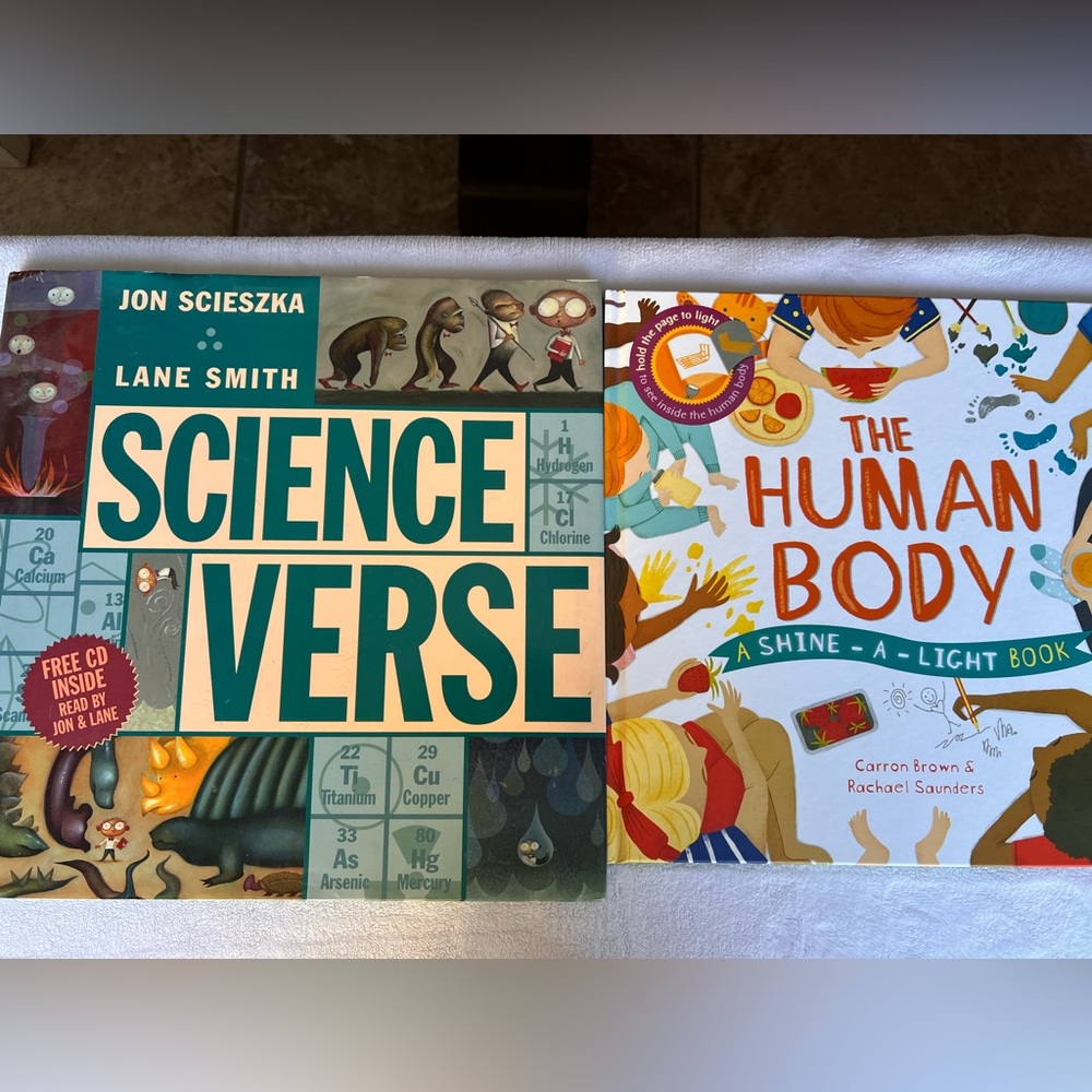 2 children’s hardback books. Science themed.